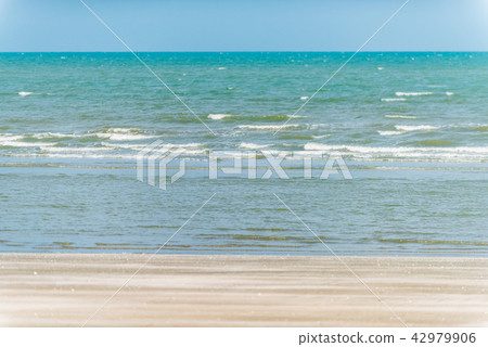 Wave of the sea on the sand beach Wave of the sea on the sand beach 42979906