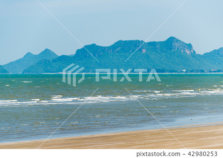 Rocks mountain in the middle of the sea Rocks mountain in the middle of the sea 42980253