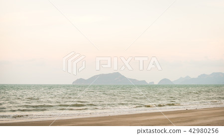 Rocks mountain in the middle of the sea 42980256