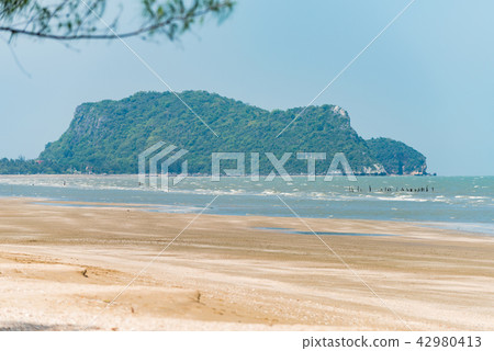 Rocks mountain in the middle of the sea 42980413