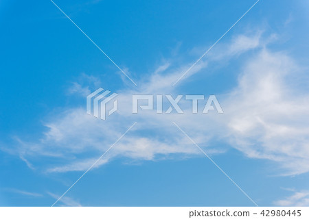 Beautiful cirrus clouds against the blue sky Beautiful cirrus clouds against the blue sky 42980445