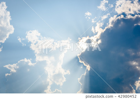 Ray of lights through the clouds Ray of lights through the clouds 42980452