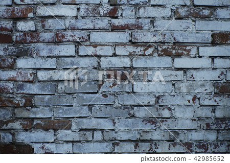 Background image: a fragment of an old brick wall. Background image: a fragment of an old brick wall. 42985652