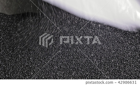 Plastic black gray granulated crumb. Manufacture of plastic water pipes factory. Process of making 42986631