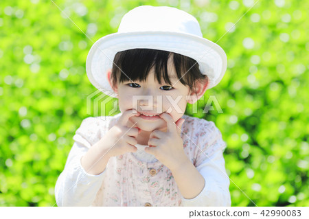 A girl smiling in nature A girl smiling in nature 42990083
