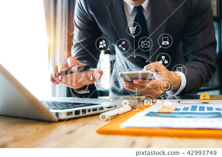 close up of businessman working with smart phone close up of businessman working with smart phone 42993749