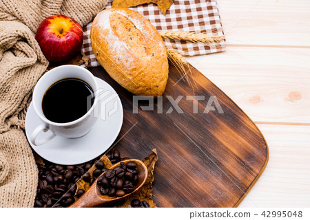 Cup of hot Coffee with toast for Autumn season 42995048
