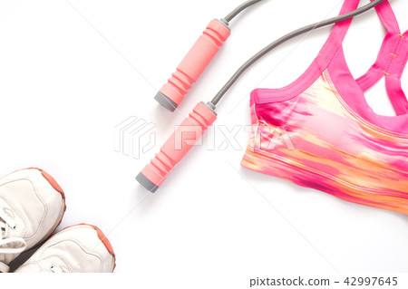 Sporty woman clothing and equipment on white 42997645