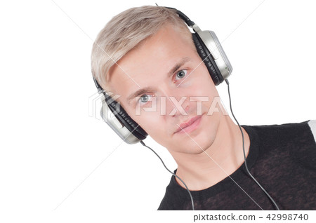 Man in headphones lissening music Man in headphones lissening music 42998740
