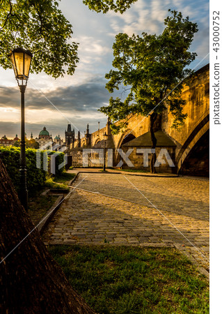 Charles Bridge sunlit in the morning Charles Bridge sunlit in the morning 43000752