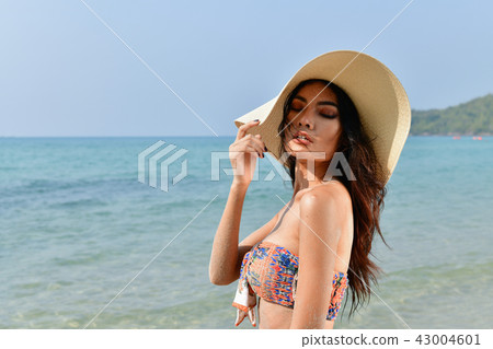 Sexy girl concept in swimsuit. Beautiful woman wearing a swimsui 43004601