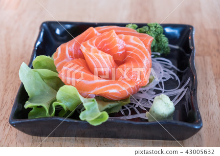 Close up of salmon sashimi. 43005632