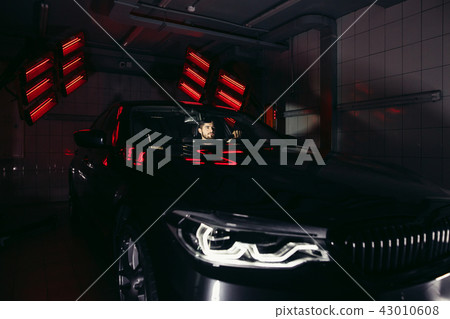 lamps for drying the ceramic coating are behind car lamps for drying the ceramic coating are behind car 43010608