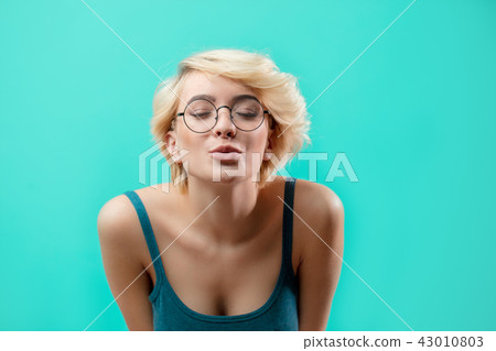 sexy blondy with closed eyes is keeping lips as she is going to kiss someone sexy blondy with closed eyes is keeping lips as she is going to kiss someone 43010803