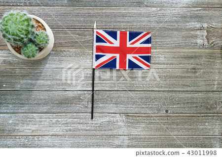 United Kingdom flag on a gray table United Kingdom flag on a gray table 43011998