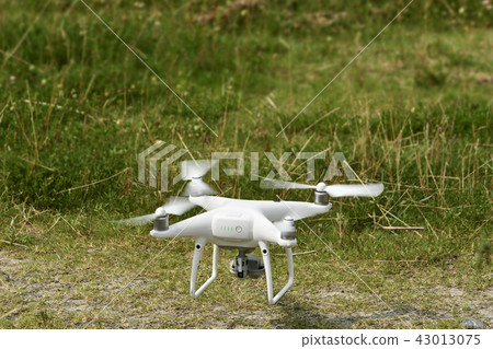 Compact drone in flight Compact drone in flight 43013075