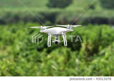 Compact drone in flight 43013076