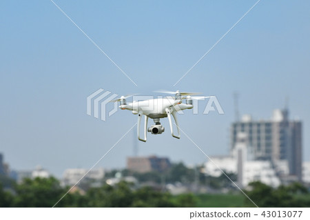 Compact drone in flight Compact drone in flight 43013077