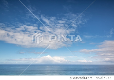 Aerial. Outdoor ocean white clouds poetic image. 43013252