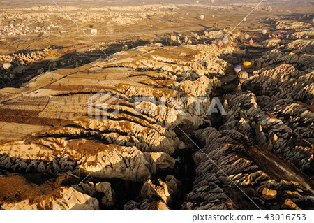 Flying hot-air balloons in Cappadocia Flying hot-air balloons in Cappadocia 43016753