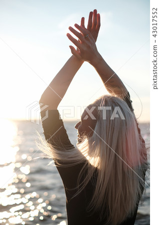 Lifestyle portrait of happy young blonde woman Lifestyle portrait of happy young blonde woman 43017552