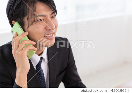Middle-aged men calling 43019634