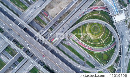 Aerial view highway road network connection. Aerial view highway road network connection. 43019806