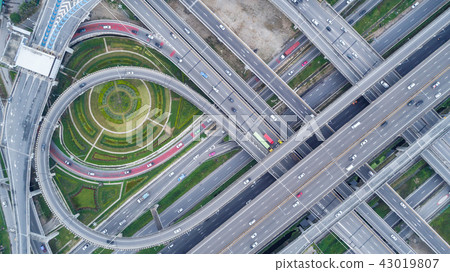Aerial view highway road network connection. Aerial view highway road network connection. 43019807