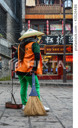 Road sweeper worker cleaning city street Road sweeper worker cleaning city street 43026486