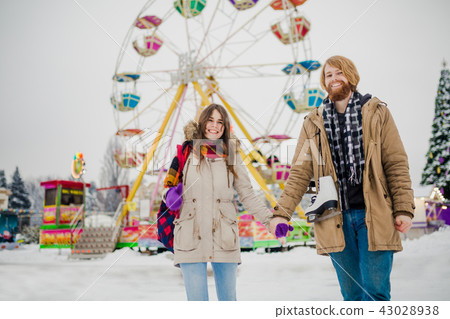 Young couple in love with a happy young man with a beard and a woman on a background of a fucking 43028938