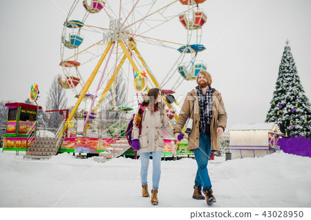 Young couple in love with a happy young man.. image photo