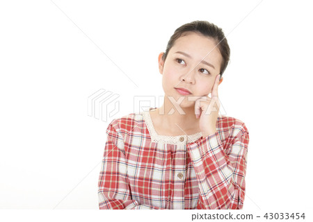 A woman with a depressed face A woman with a depressed face 43033454