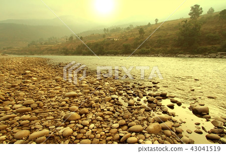 Rocky riverside with gloden sunrise in the morning 43041519