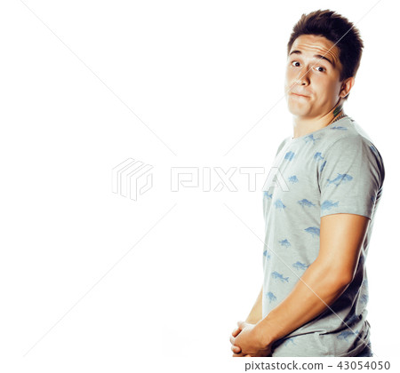 young handsome teenage hipster guy posing emotional, happy smili 43054050
