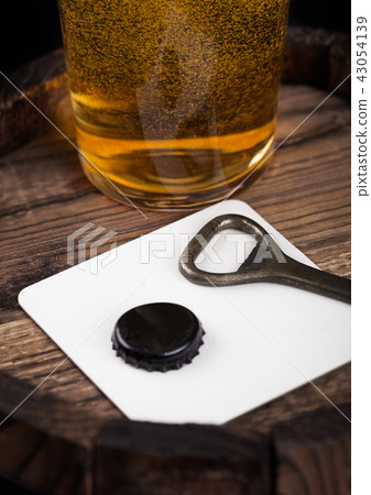 Beer coaster with bottle top and opener and glass Beer coaster with bottle top and opener and glass 43054139