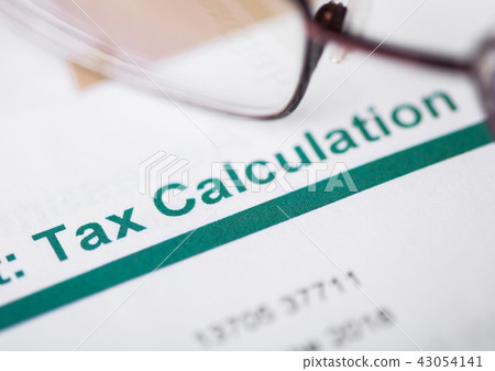 Tax Calculation statement paper with envelopes Tax Calculation statement paper with envelopes 43054141