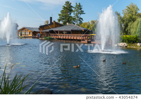 Wonderful view of the lake with high fountains and Wonderful view of the lake with high fountains and 43054874