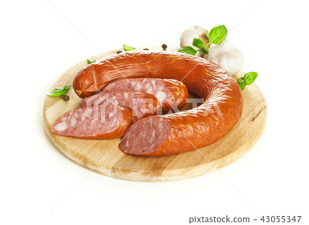 Krakow sausage isolated on white background Krakow sausage isolated on white background 43055347