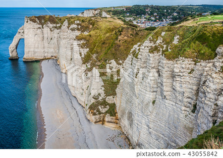 The famous cliffs at Etretat in Normandy, France The famous cliffs at Etretat in Normandy, France 43055842