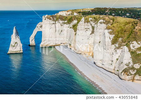 The famous cliffs at Etretat in Normandy, France The famous cliffs at Etretat in Normandy, France 43055848