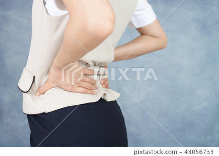 woman suffering from back pain woman suffering from back pain 43056733
