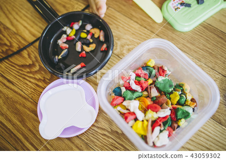 Colorful clay in the container Colorful clay in the container 43059302