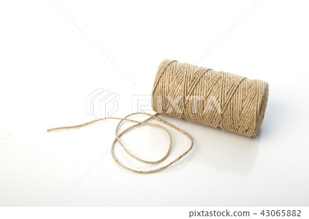 Natural string roll  on white 43065882