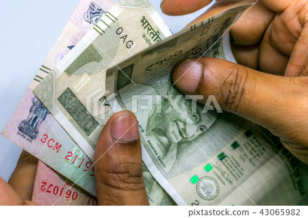 Counting Indian rupee currency,money Counting Indian rupee currency,money 43065982