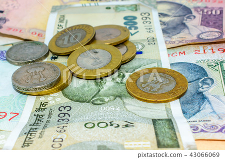 Piles of currency Indian Rupees in denominations. 43066069