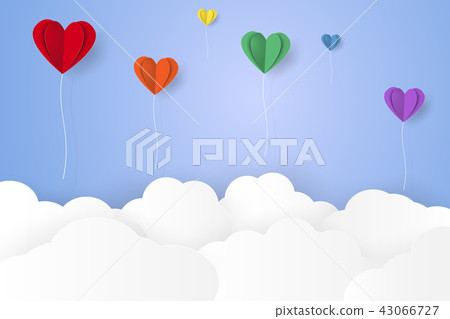 Colorful heart balloons flying over grass Colorful heart balloons flying over grass 43066727
