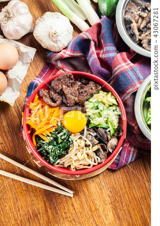 Bibimbap - rice with beef and vegetables 43067281