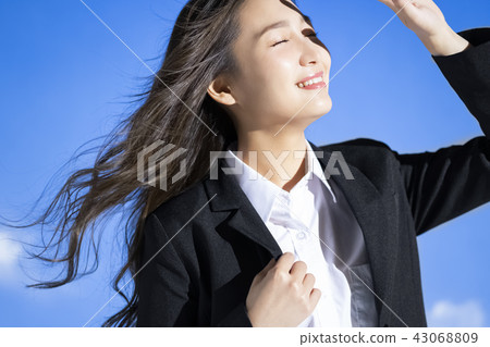 Blue sky and business woman portrait Blue sky and business woman portrait 43068809