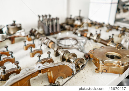 The internal combustion engine, disassembled, repair at car service, overhaul. Repair at car service The internal combustion engine, disassembled, repair at car service, overhaul. Repair at car service 43070437