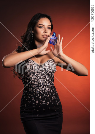 Elegant beautiful luxurious woman with perfume  43070893